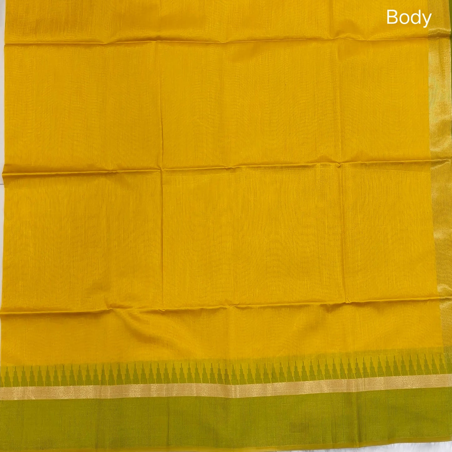 Mehandhi yellow with mossy green silk cotton saree with thread woven double side borders, zari striped short pallu and contrast blouse with borders. NS85