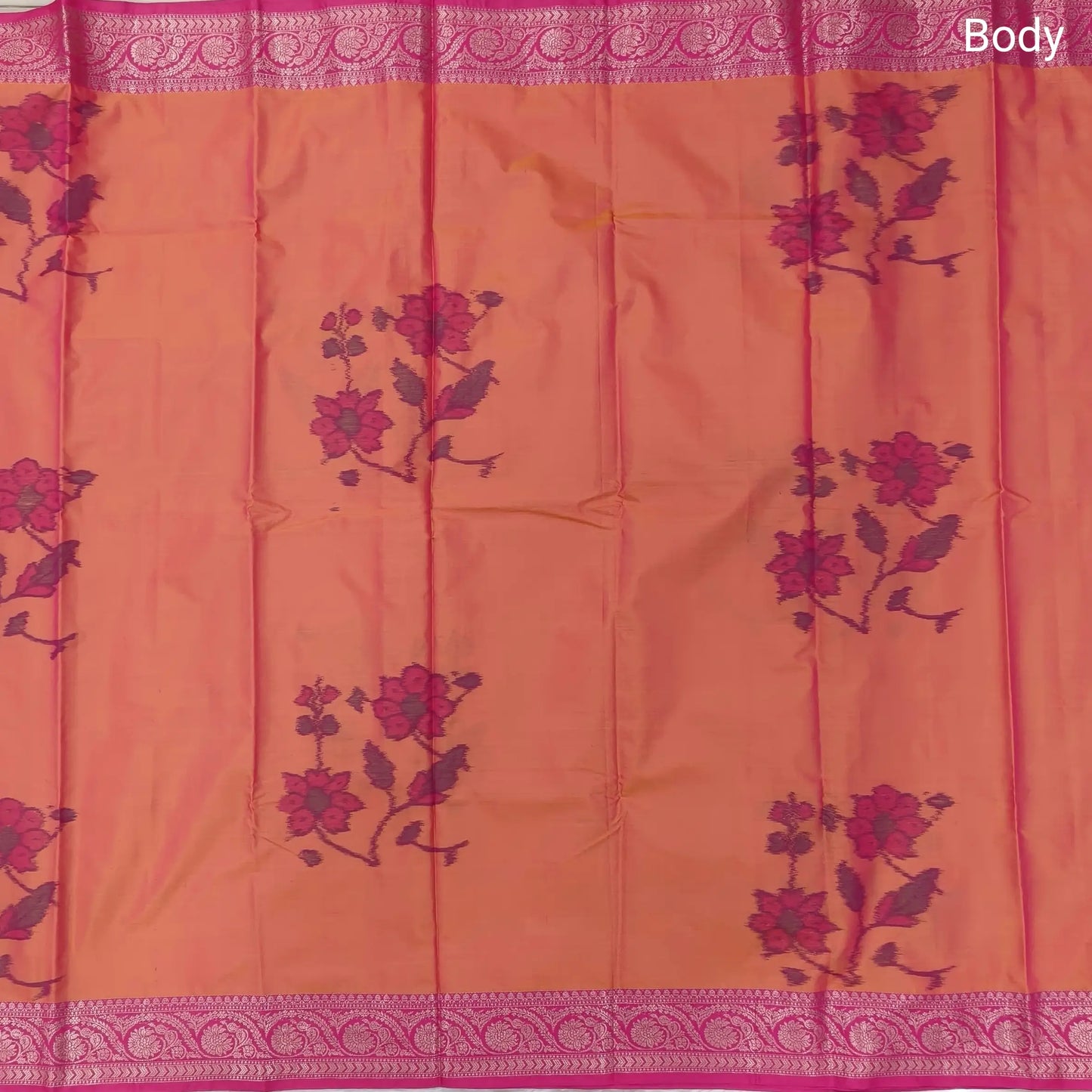 Peachish Pink dual shaded ikat printed soft silk saree with silver zari woven double side borders, contrast printed pallu, contrast running blouse with zari woven borders. NS95