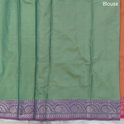 Peachish Pink dual shaded ikat printed soft silk saree with silver zari woven double side borders, contrast printed pallu, contrast running blouse with zari woven borders. NS95