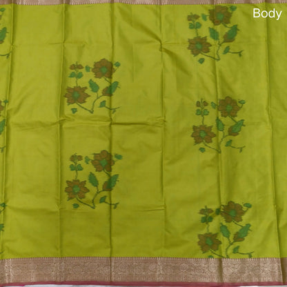 Leafy green dual shaded ikat printed soft silk saree with silver zari woven double side borders, contrast printed pallu, contrast running blouse with zari woven borders. NS98