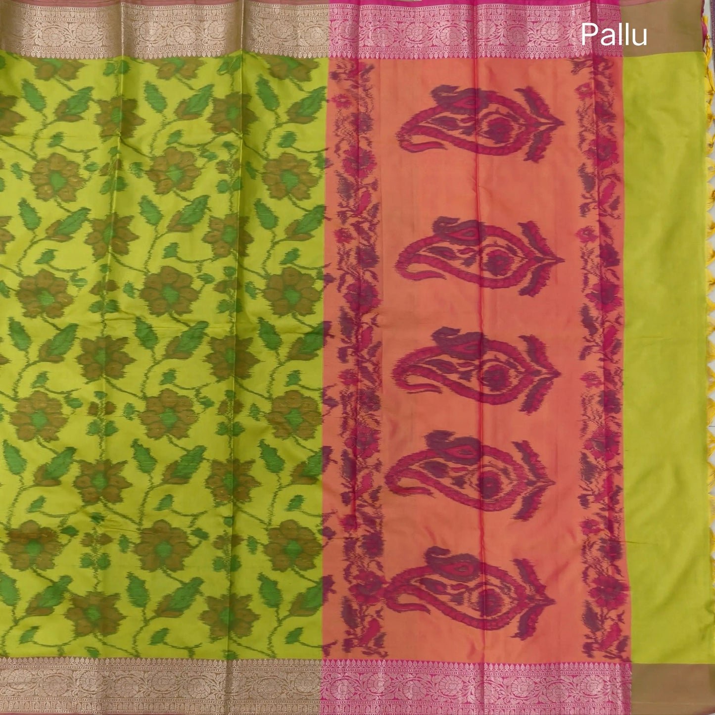 Leafy green dual shaded ikat printed soft silk saree with silver zari woven double side borders, contrast printed pallu, contrast running blouse with zari woven borders. NS98