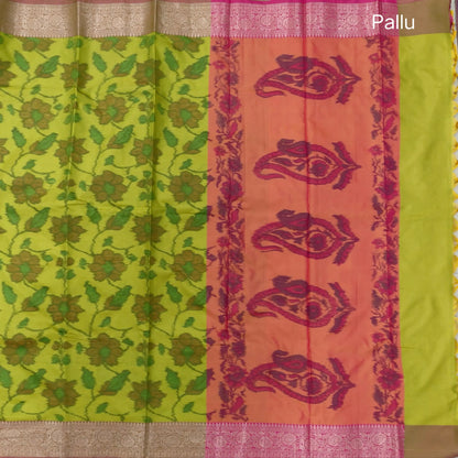Leafy green dual shaded ikat printed soft silk saree with silver zari woven double side borders, contrast printed pallu, contrast running blouse with zari woven borders. NS98