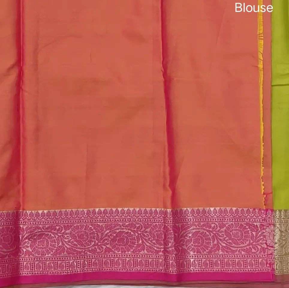 Leafy green dual shaded ikat printed soft silk saree with silver zari woven double side borders, contrast printed pallu, contrast running blouse with zari woven borders. NS98