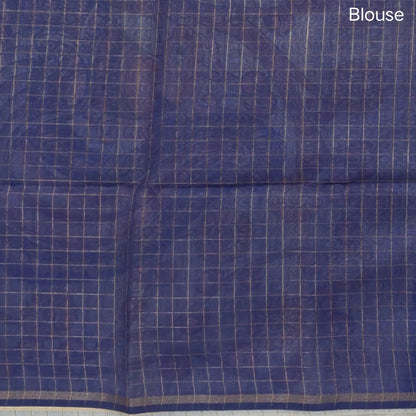 Light blue, yellow and dark blue shibori printed soft silk cotton saree with zari checks all over, contrast kalamkari print on pallu, contrast running blouse with zari checks. NS90