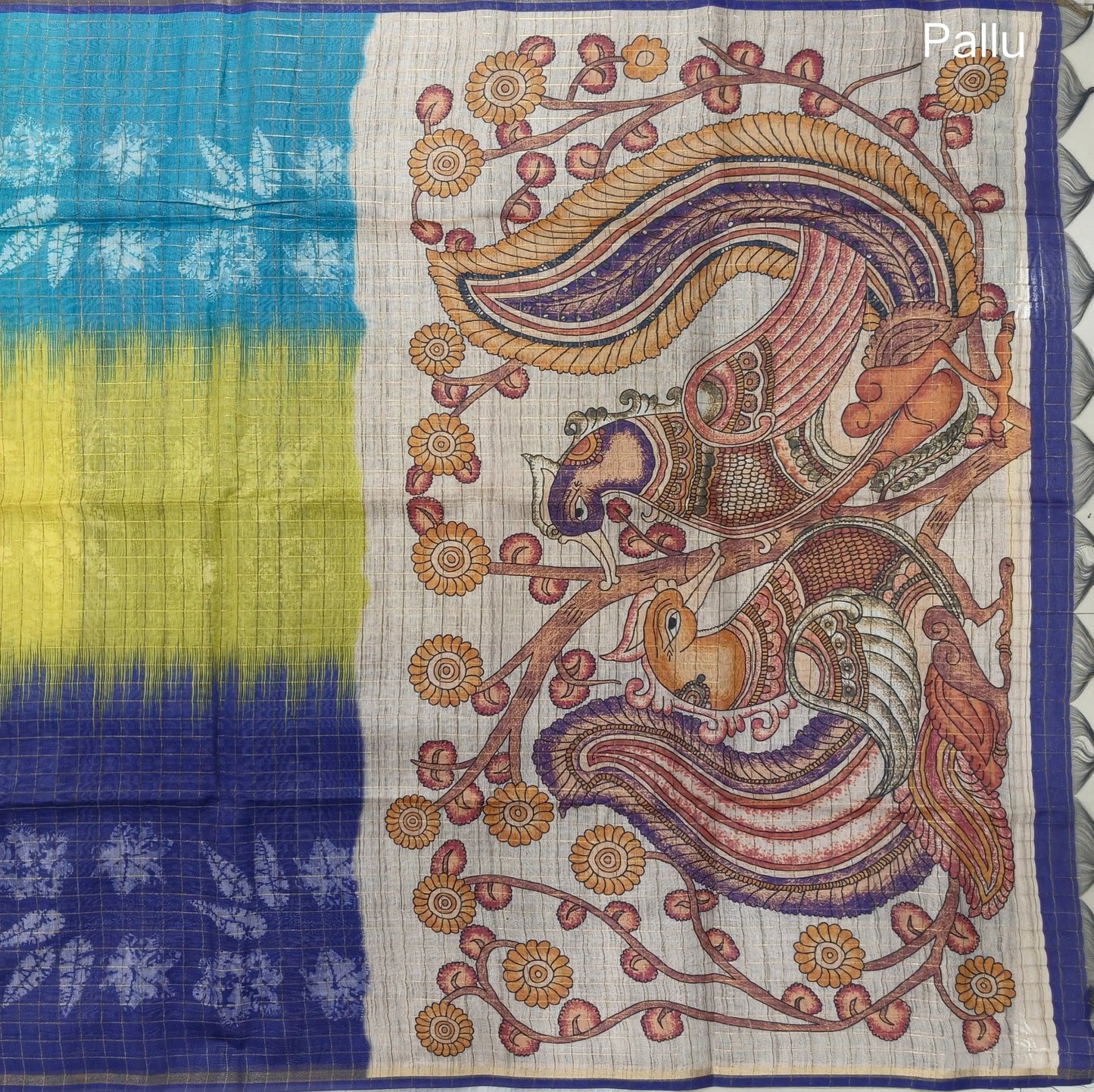 Light blue, yellow and dark blue shibori printed soft silk cotton saree with zari checks all over, contrast kalamkari print on pallu, contrast running blouse with zari checks. NS90