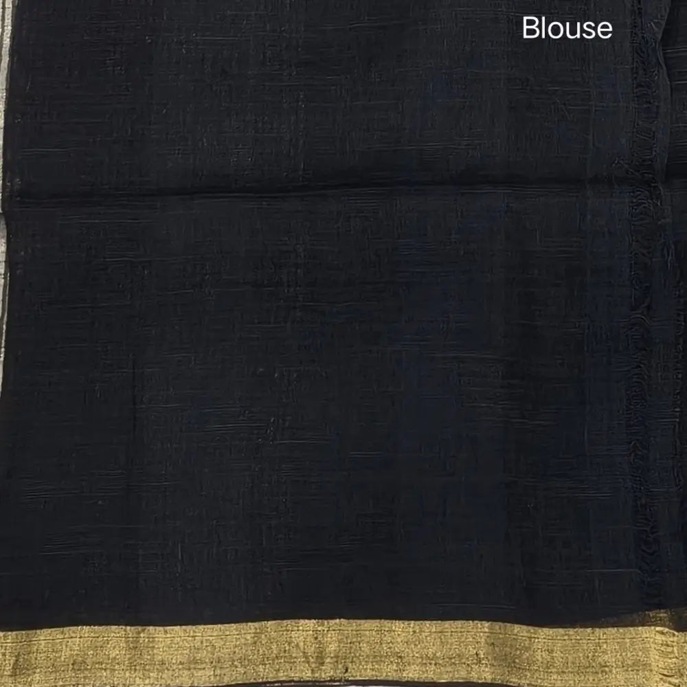 Black pure linen jamdani woven saree, with gold tissue double side borders,striped tissue pallu with tassles, plain running blouse with borders.(DRY CLEAN RECOMMENDED ). NS113