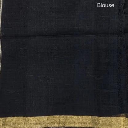 Black pure linen jamdani woven saree, with gold tissue double side borders,striped tissue pallu with tassles, plain running blouse with borders.(DRY CLEAN RECOMMENDED ). NS113
