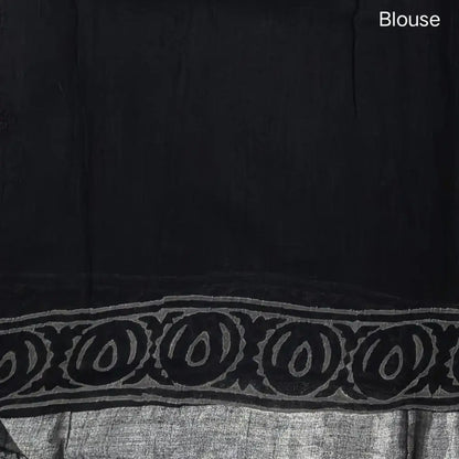 Black block printed linen cotton saree with double side silver zari borders (lightweight,soft) printed pallu with silver zari stripes, plain running blouse with borders. NS111