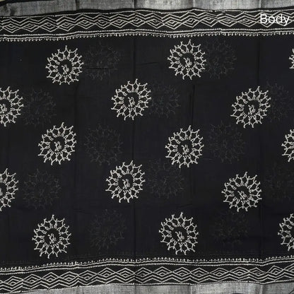 Black block printed linen cotton saree with double side silver zari borders (lightweight,soft) printed pallu with silver zari stripes, plain running blouse with borders. NS108