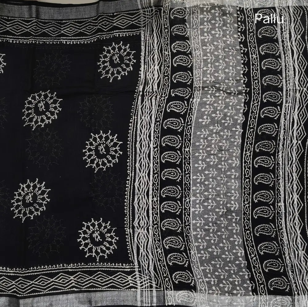 Black block printed linen cotton saree with double side silver zari borders (lightweight,soft) printed pallu with silver zari stripes, plain running blouse with borders. NS108