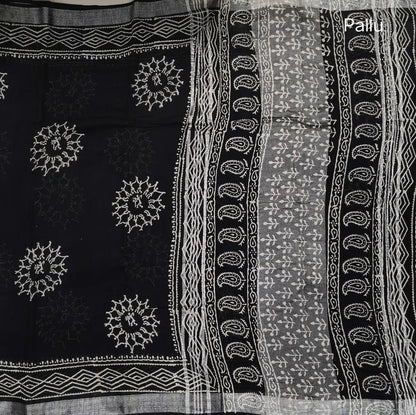 Black block printed linen cotton saree with double side silver zari borders (lightweight,soft) printed pallu with silver zari stripes, plain running blouse with borders. NS108