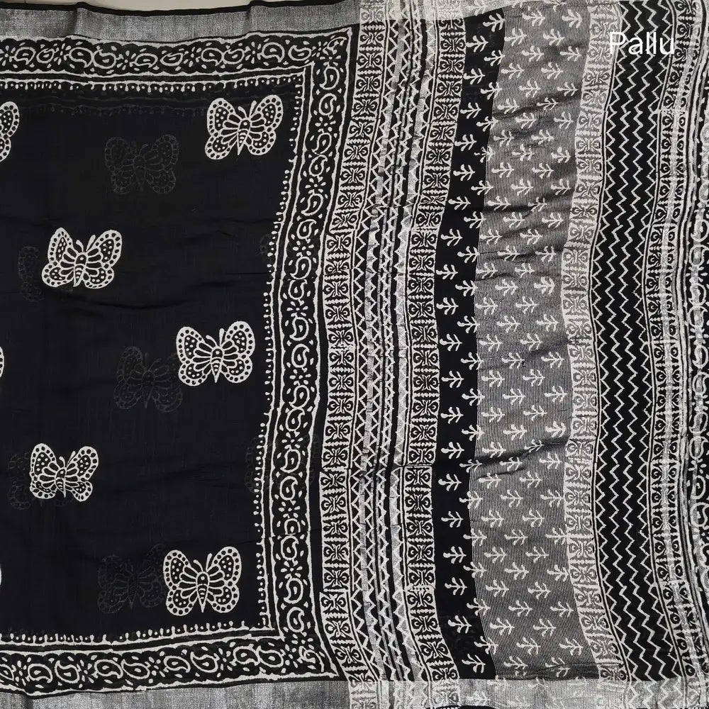 Black block printed linen cotton saree with double side silver zari borders (lightweight,soft) printed pallu with silver zari stripes, plain running blouse with borders. NS110