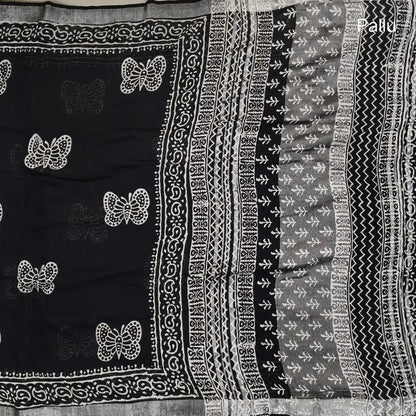 Black block printed linen cotton saree with double side silver zari borders (lightweight,soft) printed pallu with silver zari stripes, plain running blouse with borders. NS110