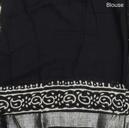 Black block printed linen cotton saree with double side silver zari borders (lightweight,soft) printed pallu with silver zari stripes, plain running blouse with borders. NS110