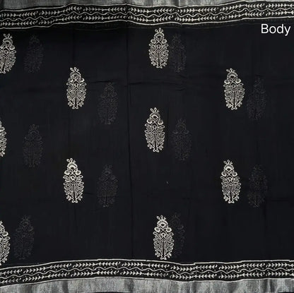 Black block printed linen cotton saree with double side silver zari borders (lightweight,soft) printed pallu with silver zari stripes, plain running blouse with borders. NS109