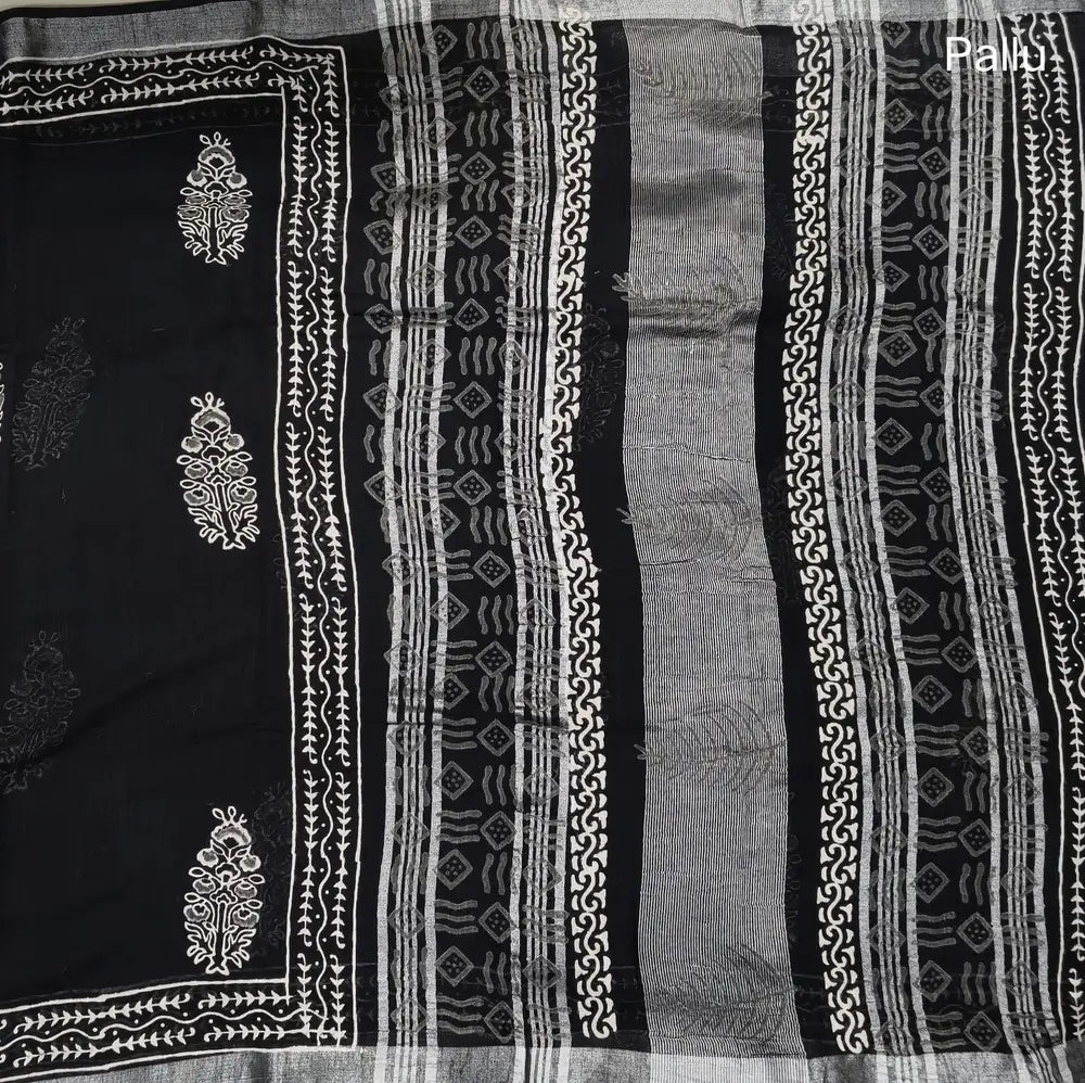 Black block printed linen cotton saree with double side silver zari borders (lightweight,soft) printed pallu with silver zari stripes, plain running blouse with borders. NS109