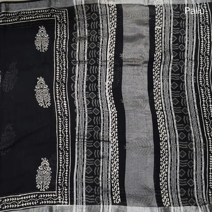 Black block printed linen cotton saree with double side silver zari borders (lightweight,soft) printed pallu with silver zari stripes, plain running blouse with borders. NS109