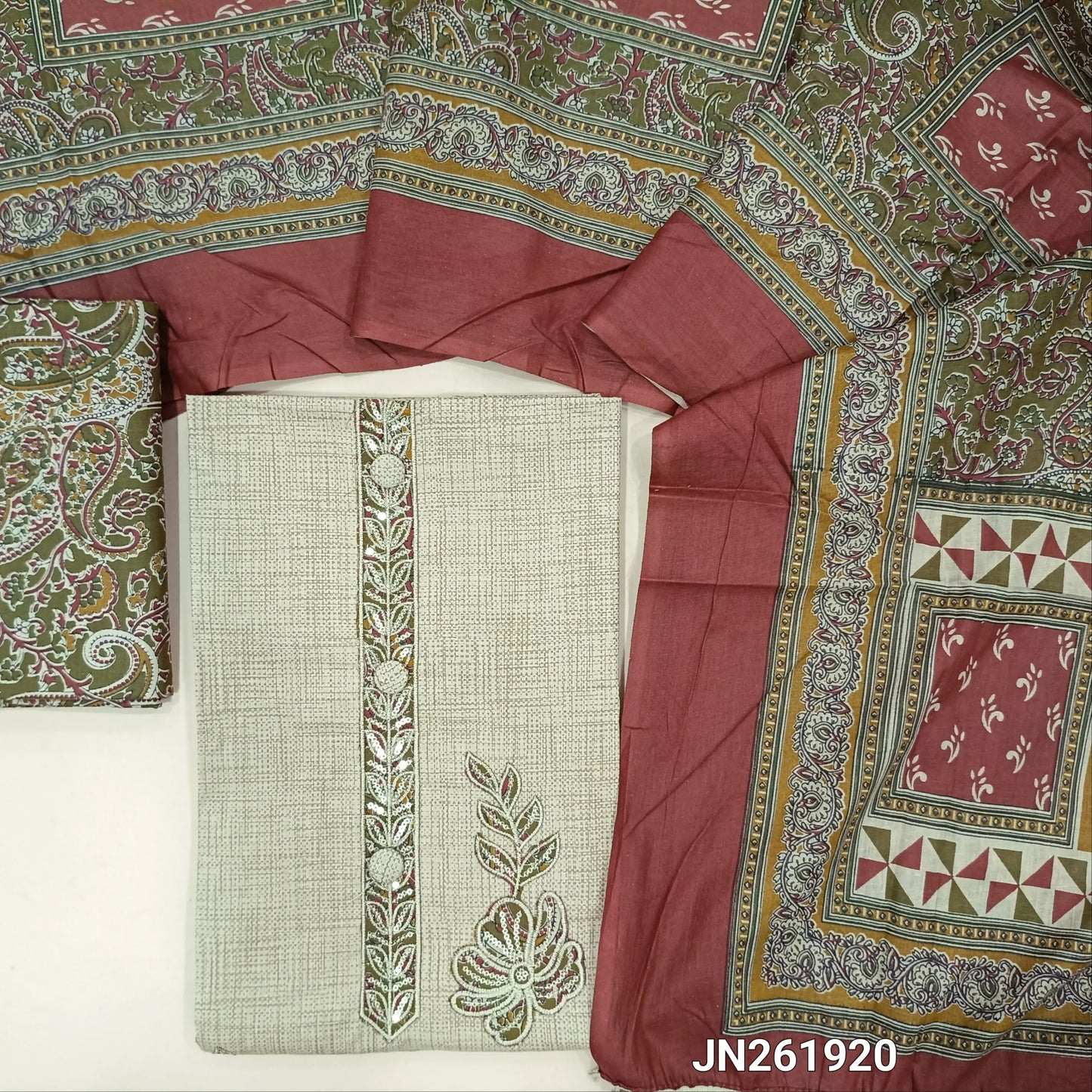 Beige pure soft cotton unstitched salwar material,embroidery, applique patch work on yoke,floral applique work on front(green)(lining needed)printed cotton bottom, printed full length mul cotton dupatta. JN261920