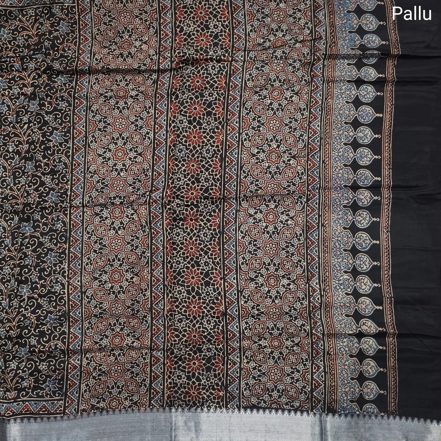 Black ajrak hand block printed pure dola silk saree, benarasi zari woven double side borders, hand block printed pallu, running blouse with borders.(DRY CLEAN RECOMMENDED , MILD STAINS AND DYES ARE NOT DEFECTS). NS102