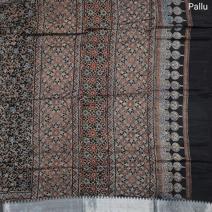 Black ajrak hand block printed pure dola silk saree, benarasi zari woven double side borders, hand block printed pallu, running blouse with borders.(DRY CLEAN RECOMMENDED , MILD STAINS AND DYES ARE NOT DEFECTS). NS102