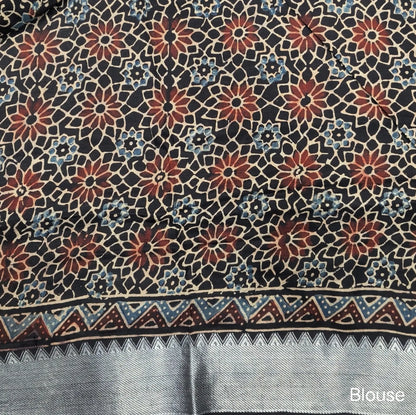 Black ajrak hand block printed pure dola silk saree, benarasi zari woven double side borders, hand block printed pallu, running blouse with borders.(DRY CLEAN RECOMMENDED , MILD STAINS AND DYES ARE NOT DEFECTS). NS102