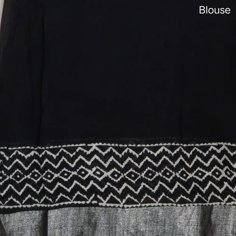 Black block printed linen cotton saree with double side silver zari borders (lightweight,soft) printed pallu with silver zari stripes, plain running blouse with borders. NS107