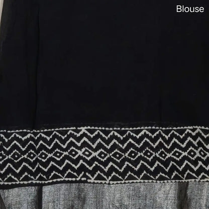 Black block printed linen cotton saree with double side silver zari borders (lightweight,soft) printed pallu with silver zari stripes, plain running blouse with borders. NS107