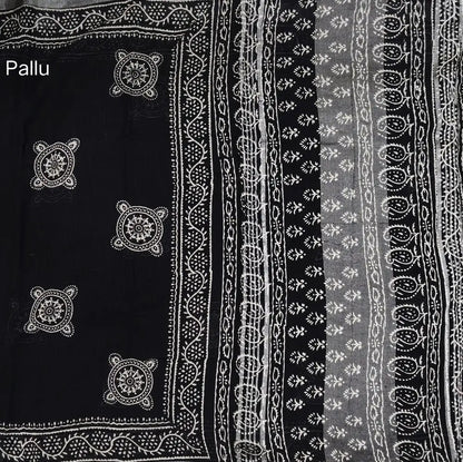 Black block printed linen cotton saree with double side silver zari borders (lightweight,soft) printed pallu with silver zari stripes, plain running blouse with borders. NS105