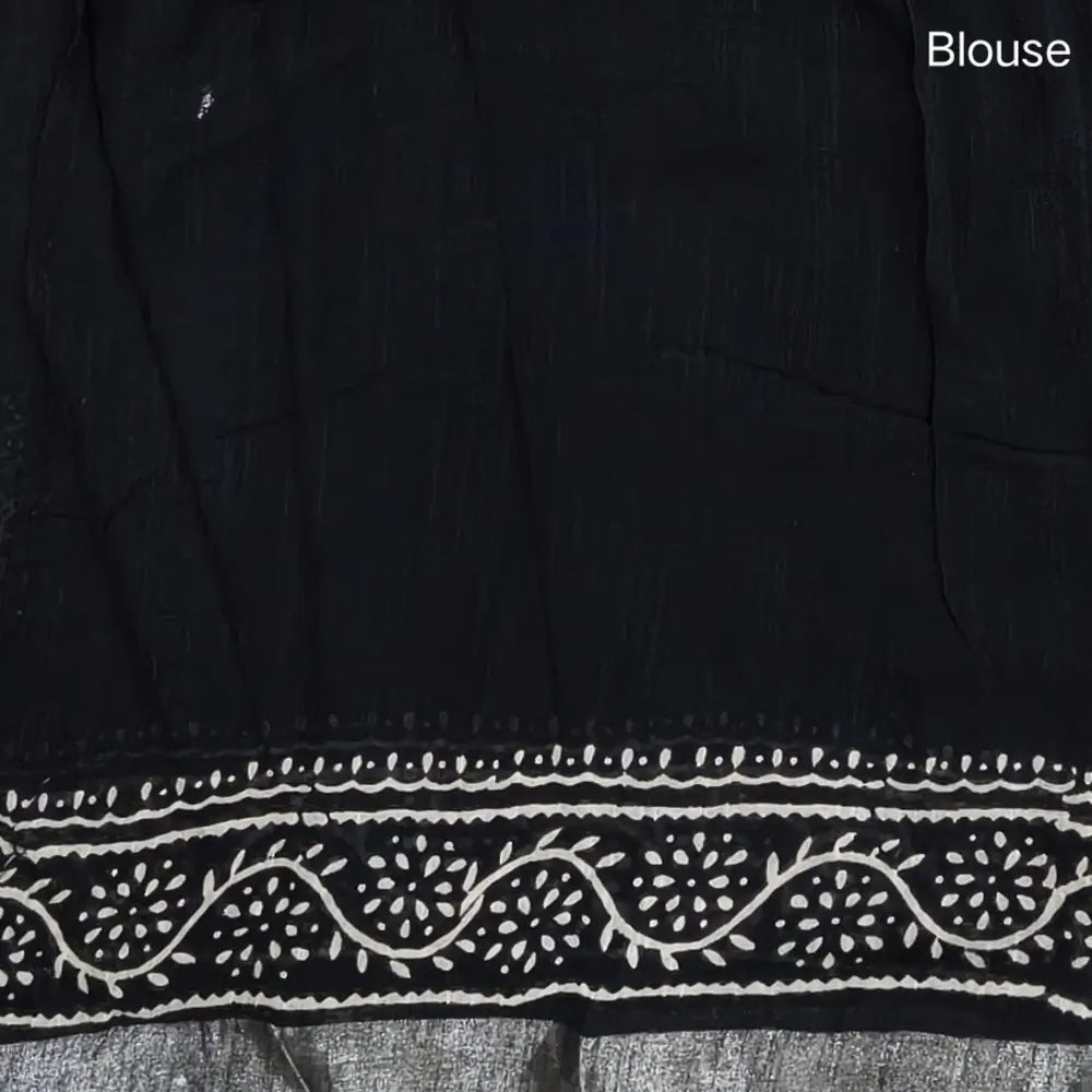 Black block printed linen cotton saree with double side silver zari borders (lightweight,soft) printed pallu with silver zari stripes, plain running blouse with borders. NS105