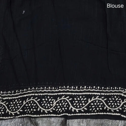 Black block printed linen cotton saree with double side silver zari borders (lightweight,soft) printed pallu with silver zari stripes, plain running blouse with borders. NS105