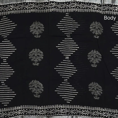 Black block printed linen cotton saree with double side silver zari borders (lightweight,soft) printed pallu with silver zari stripes, plain running blouse with borders. NS104