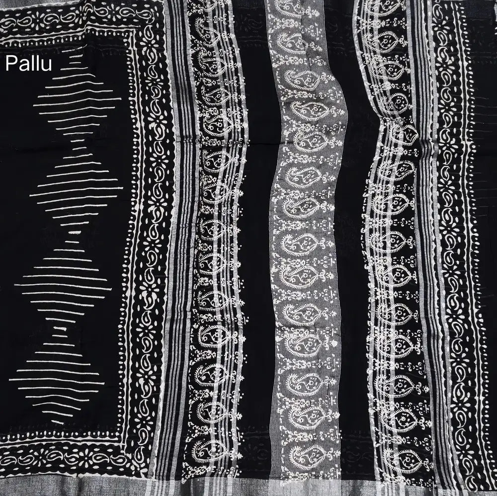 Black block printed linen cotton saree with double side silver zari borders (lightweight,soft) printed pallu with silver zari stripes, plain running blouse with borders. NS104