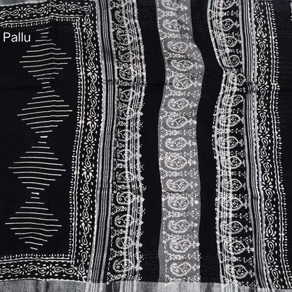 Black block printed linen cotton saree with double side silver zari borders (lightweight,soft) printed pallu with silver zari stripes, plain running blouse with borders. NS104