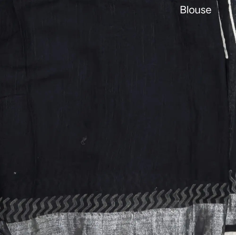 Black block printed linen cotton saree with double side silver zari borders (lightweight,soft) printed pallu with silver zari stripes, plain running blouse with borders. NS106