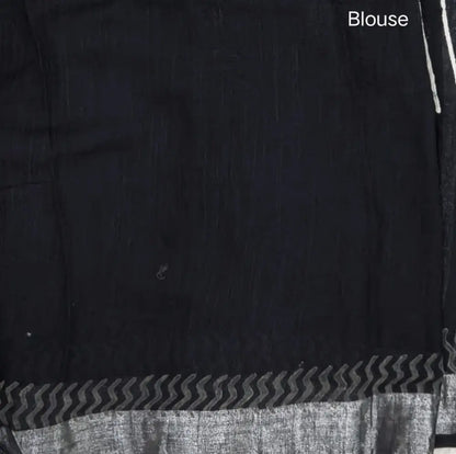Black block printed linen cotton saree with double side silver zari borders (lightweight,soft) printed pallu with silver zari stripes, plain running blouse with borders. NS106