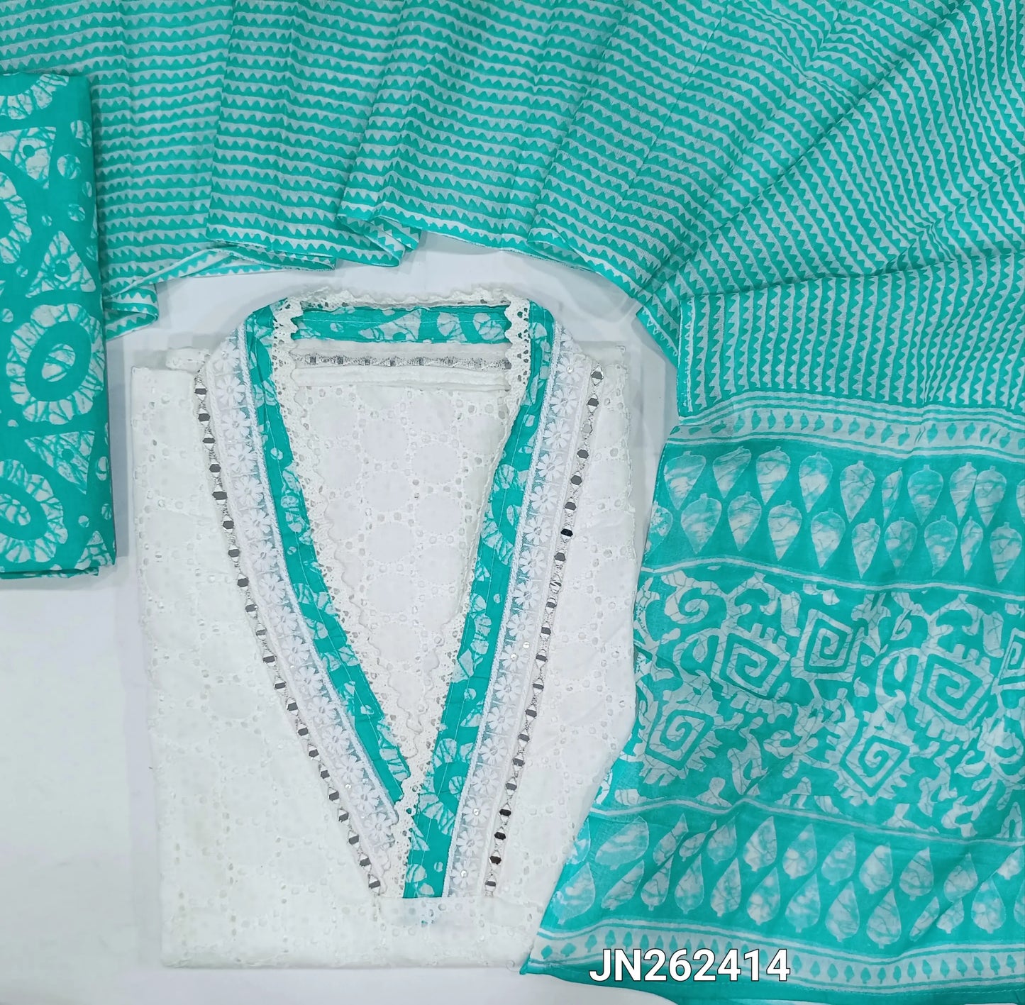 White schiffli embroidered pure cotton unstitched salwar material(lining needed) real mirror work on yoke, schiffli work all over, turquoise blue batik dyed cotton bottom, printed soft mul cotton dupatta. JN262414