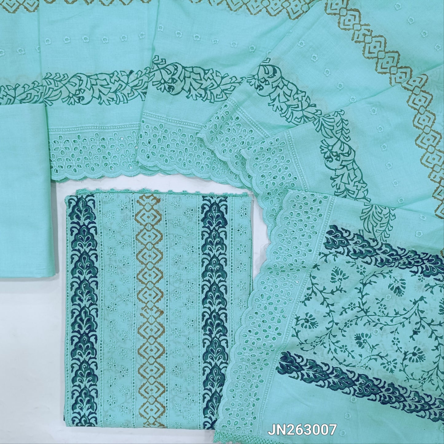 Pastel blue schiffli embroidered block printed cotton unstitched salwar material(lining needed)block prints,cut work & self embroidery work on front, cotton bottom,block printed & schiffli embroidered mul cotton dupatta with scallop borders. JN263007