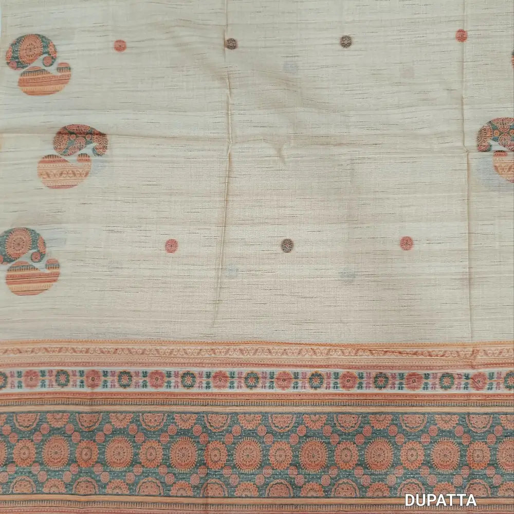 Designer beige premium tussar silk unstitched salwar material,(lining needed)weaving work on yoke,jamdani woven buttas on front & daman, silk cotton bottom, thread jamdani woven on full length tussar silk dupatta with tassels.JN262609