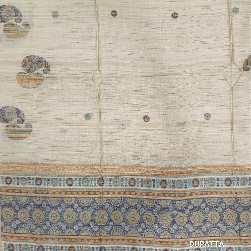 Designer beige premium tussar silk unstitched salwar material,(lining needed)weaving work on yoke,jamdani woven buttas on front & daman, silk cotton bottom, thread jamdani woven on full length tussar silk dupatta with tassels.JN262608
