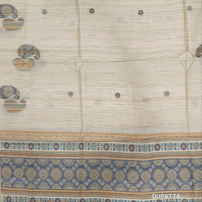 Designer beige premium tussar silk unstitched salwar material,(lining needed)weaving work on yoke,jamdani woven buttas on front & daman, silk cotton bottom, thread jamdani woven on full length tussar silk dupatta with tassels.JN262608