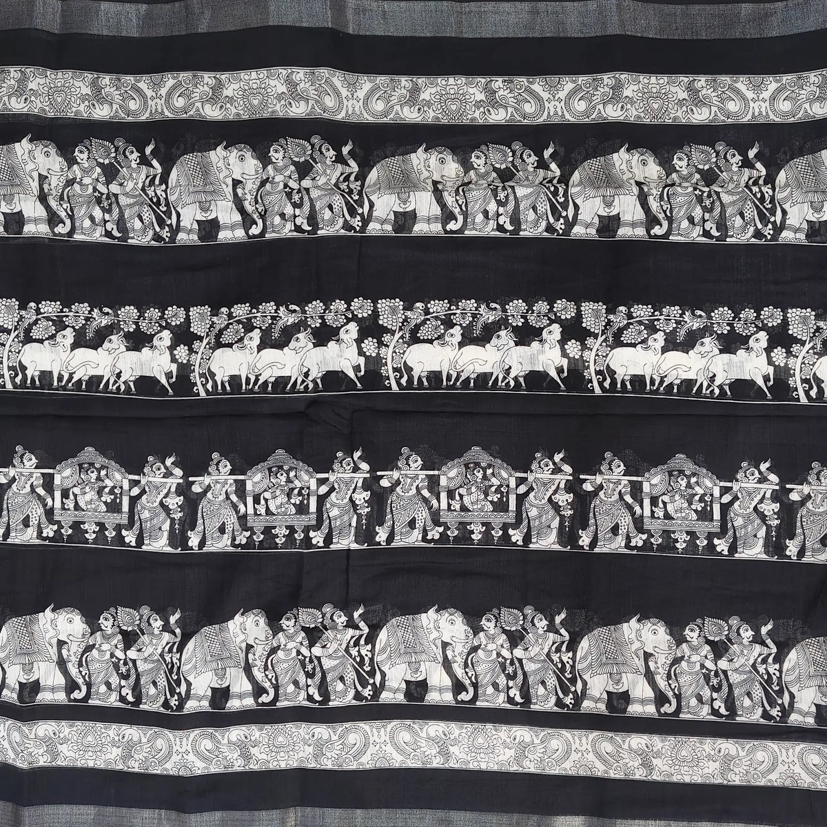 Black & white digital printed semi linen saree(lightweight,soft)with double side silver tissue borders, printed pallu and printed blouse with borders. NS116