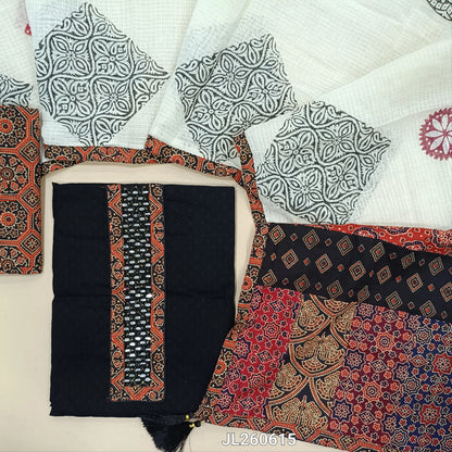 Black dobby cotton unstitched salwar material,ajrak &real mirror work on yoke,self weaving design(ORANGE)(lining needed)ajrak block printed cotton bottom, block printed kota dupatta with applique patch work on pallu. JL260615