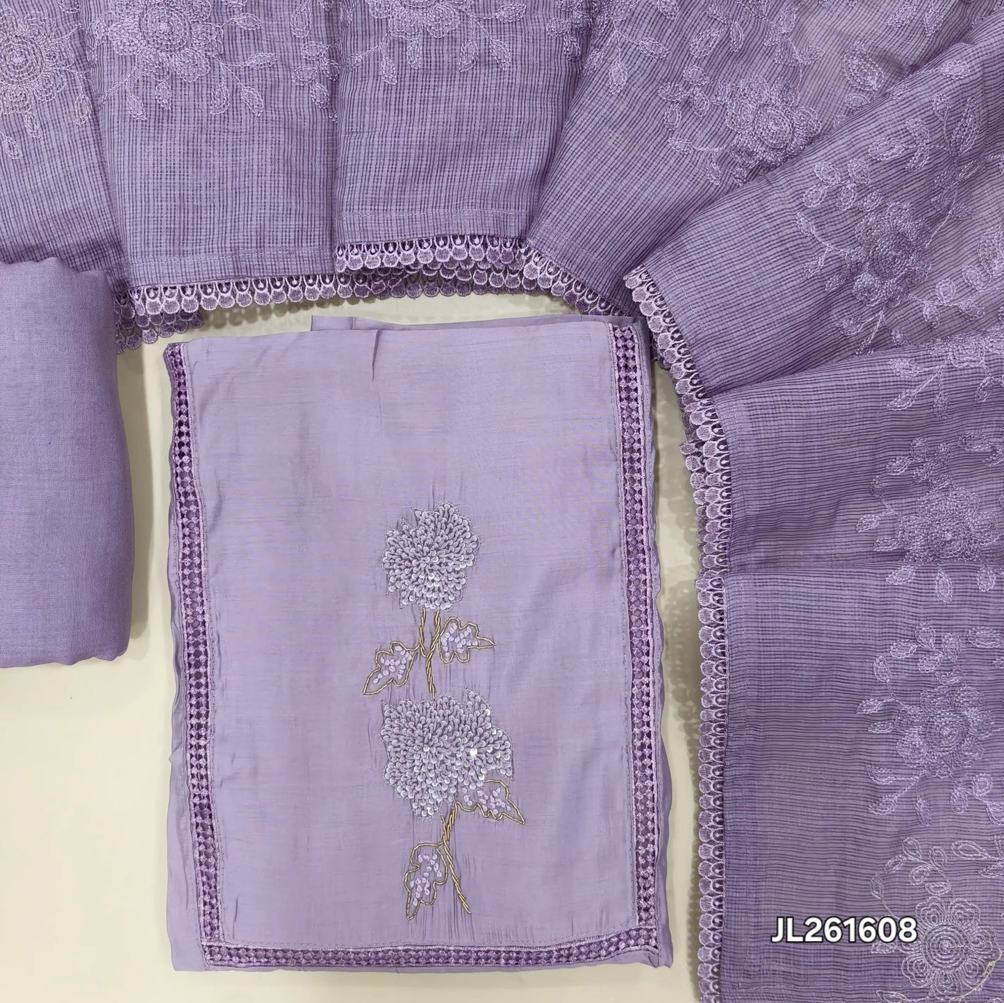 Lavender premium mul chanderi unstitched salwar material,lace work,thread,sequins and zarodzi on yoke(lining needed)spun cotton bottom, rich self embroidery work on kota dupatta. JL261608