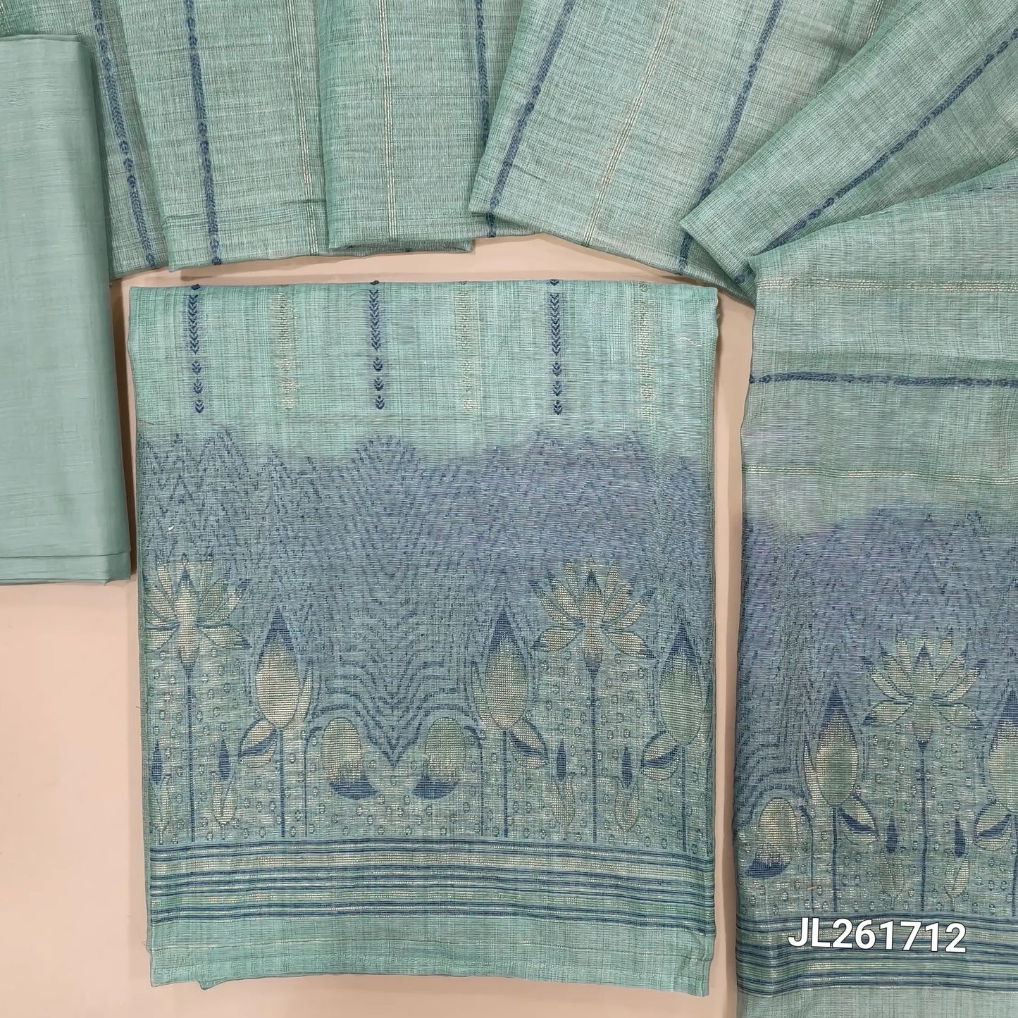 Pastel blue silk cotton unstitched salwar material, thread and zari weaving all over, weaving daman,(Lightweight, Lining Needed) silky bottom, thread and zari woven silk cotton dupatta with pallu. JL261712
