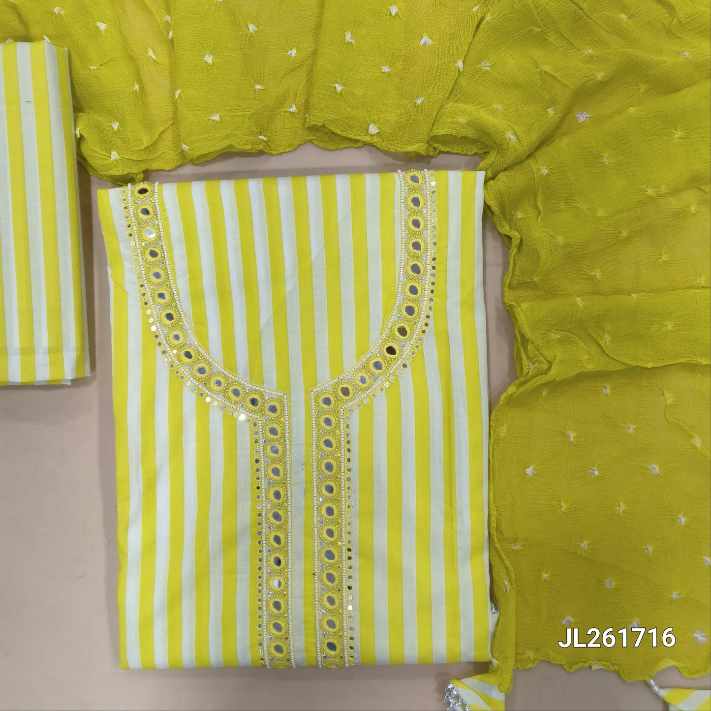 Mehandhi yellow mul cotton unstitched salwar material, real mirror, sugar bead and faux mirror on yoke, (lining needed)striped cotton bottom,tie and dye chiffon stole. JL261716