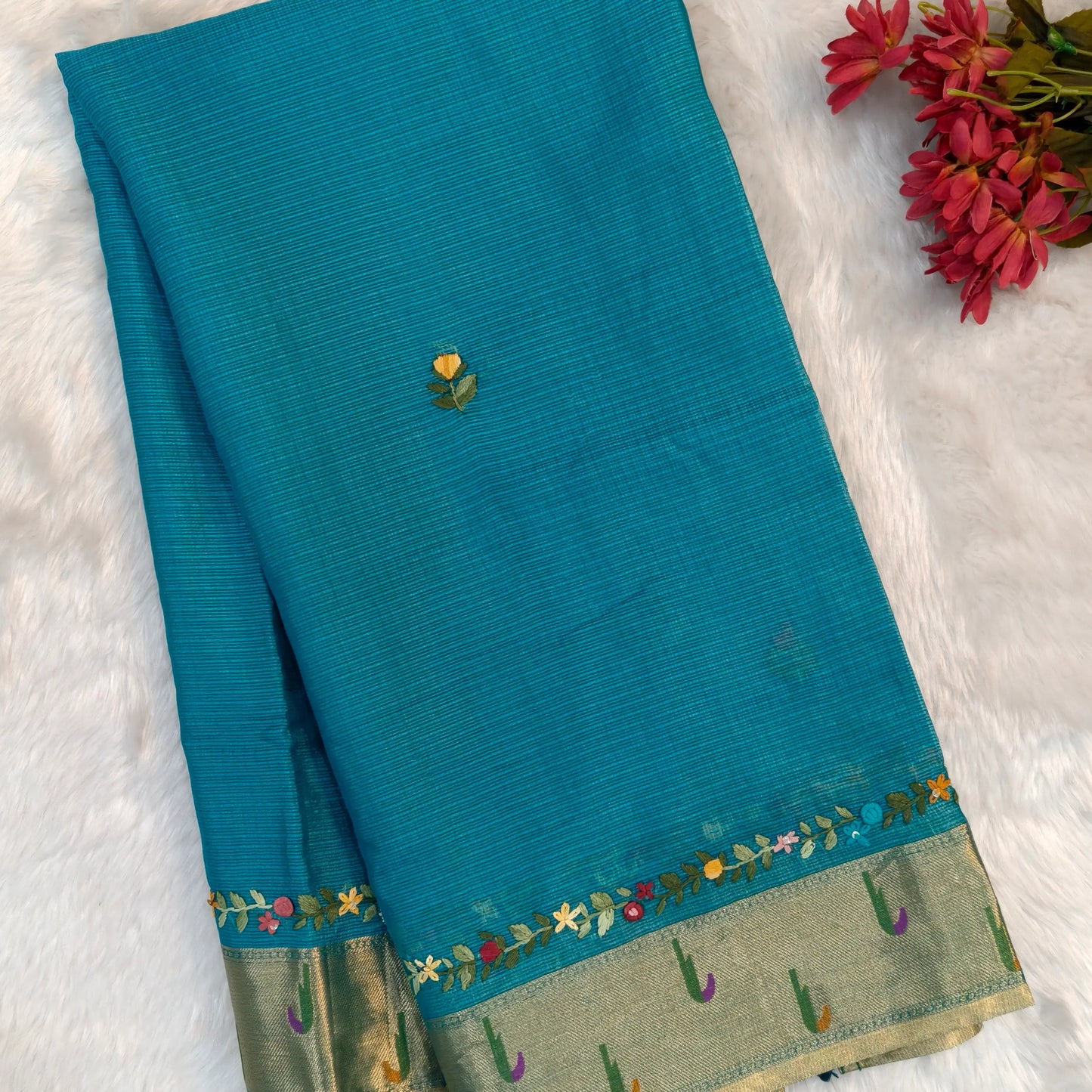Turquoise blue premium kota silk saree(soft, thin)with rich hand embroidery work all over,paithani woven double side borders,rich zari woven pallu,with hand embroidery & sequins work,running blouse with embroidery and borders. NS255