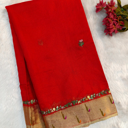 Bright red premium kota silk saree(soft, thin)with rich hand embroidery work all over,paithani woven double side borders,rich zari woven pallu,with hand embroidery & sequins work,running blouse with embroidery and borders. NS258