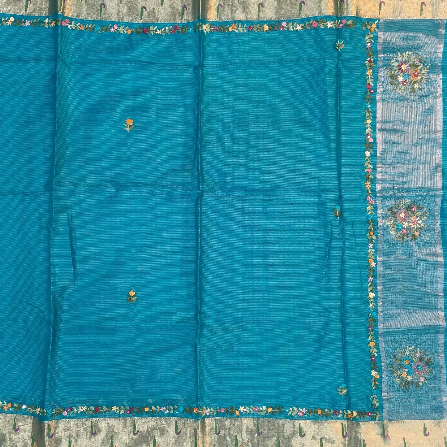 Turquoise blue premium kota silk saree(soft, thin)with rich hand embroidery work all over,paithani woven double side borders,rich zari woven pallu,with hand embroidery & sequins work,running blouse with embroidery and borders. NS255