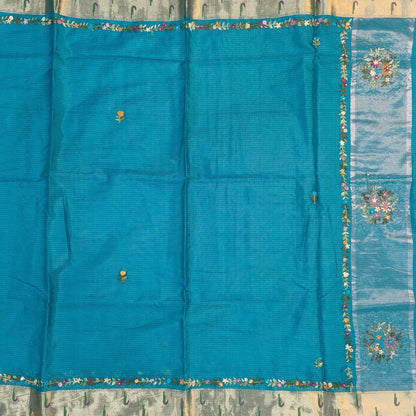 Turquoise blue premium kota silk saree(soft, thin)with rich hand embroidery work all over,paithani woven double side borders,rich zari woven pallu,with hand embroidery & sequins work,running blouse with embroidery and borders. NS255