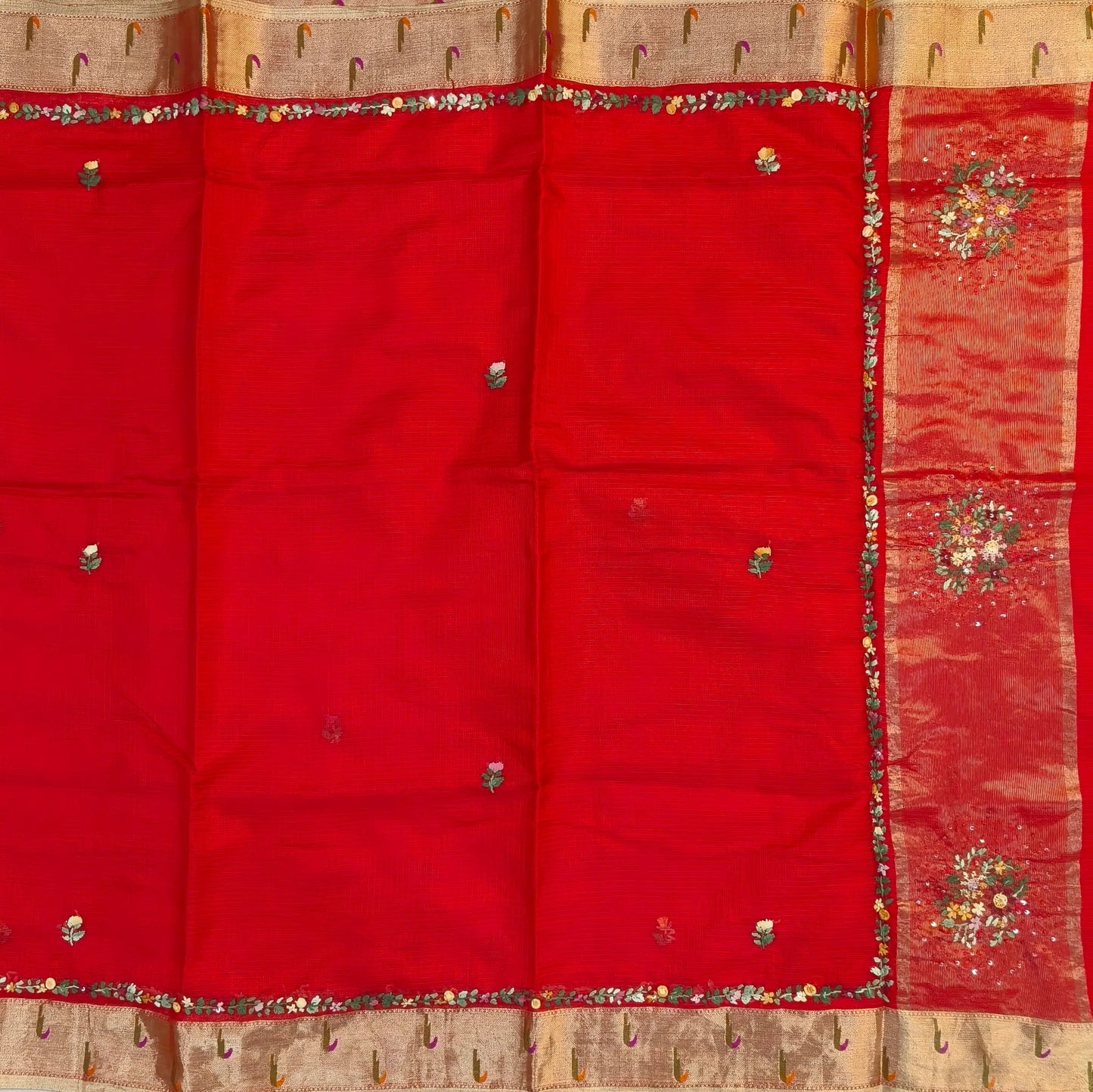 Bright red premium kota silk saree(soft, thin)with rich hand embroidery work all over,paithani woven double side borders,rich zari woven pallu,with hand embroidery & sequins work,running blouse with embroidery and borders. NS258